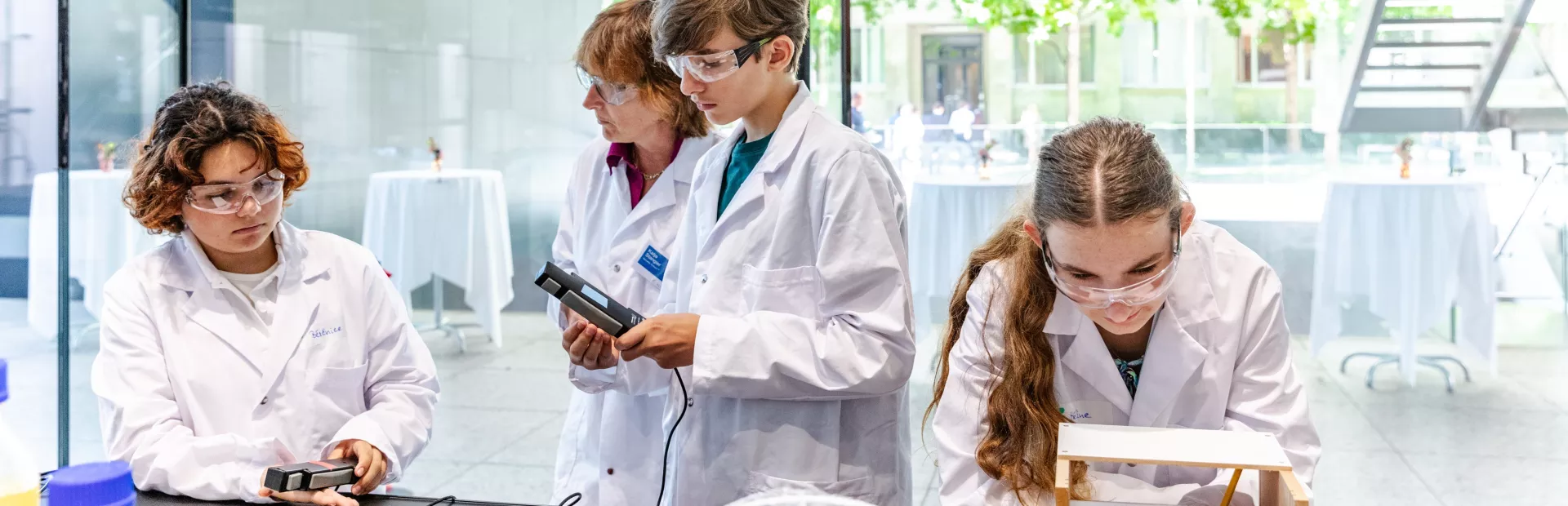 Student taking notes of experiment results